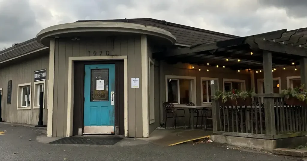 Exterior view of Blue Door Café & Bakery in Cuyahoga Falls showing its signature blue façade and welcoming entrance.